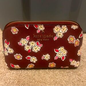 Kate Spade Tinsel Frosted Floral Deep Berry cosmetic bag. NWOT.